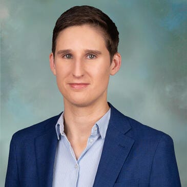 a man in a blue shirt