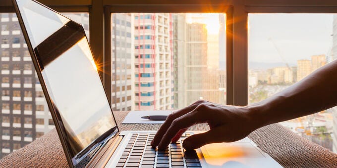 hand on a laptop
