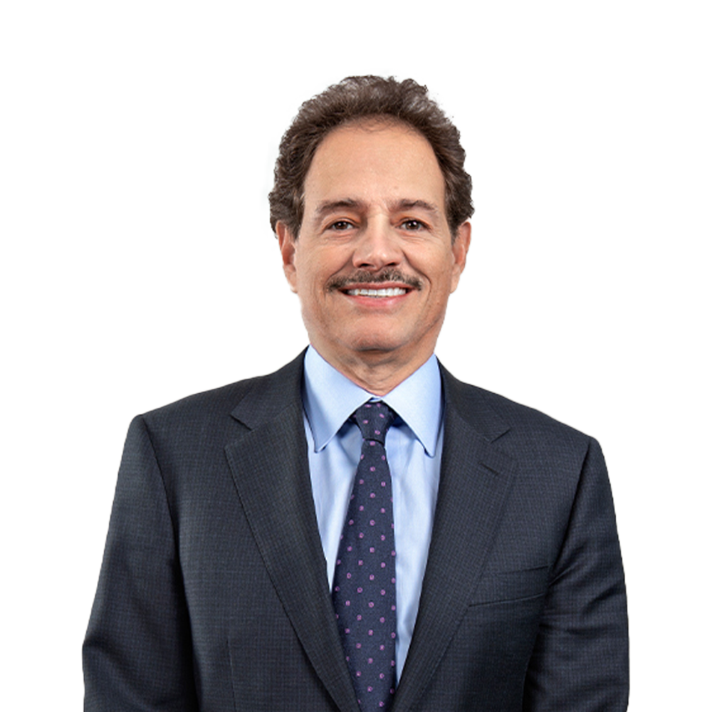 a man in a suit smiling
